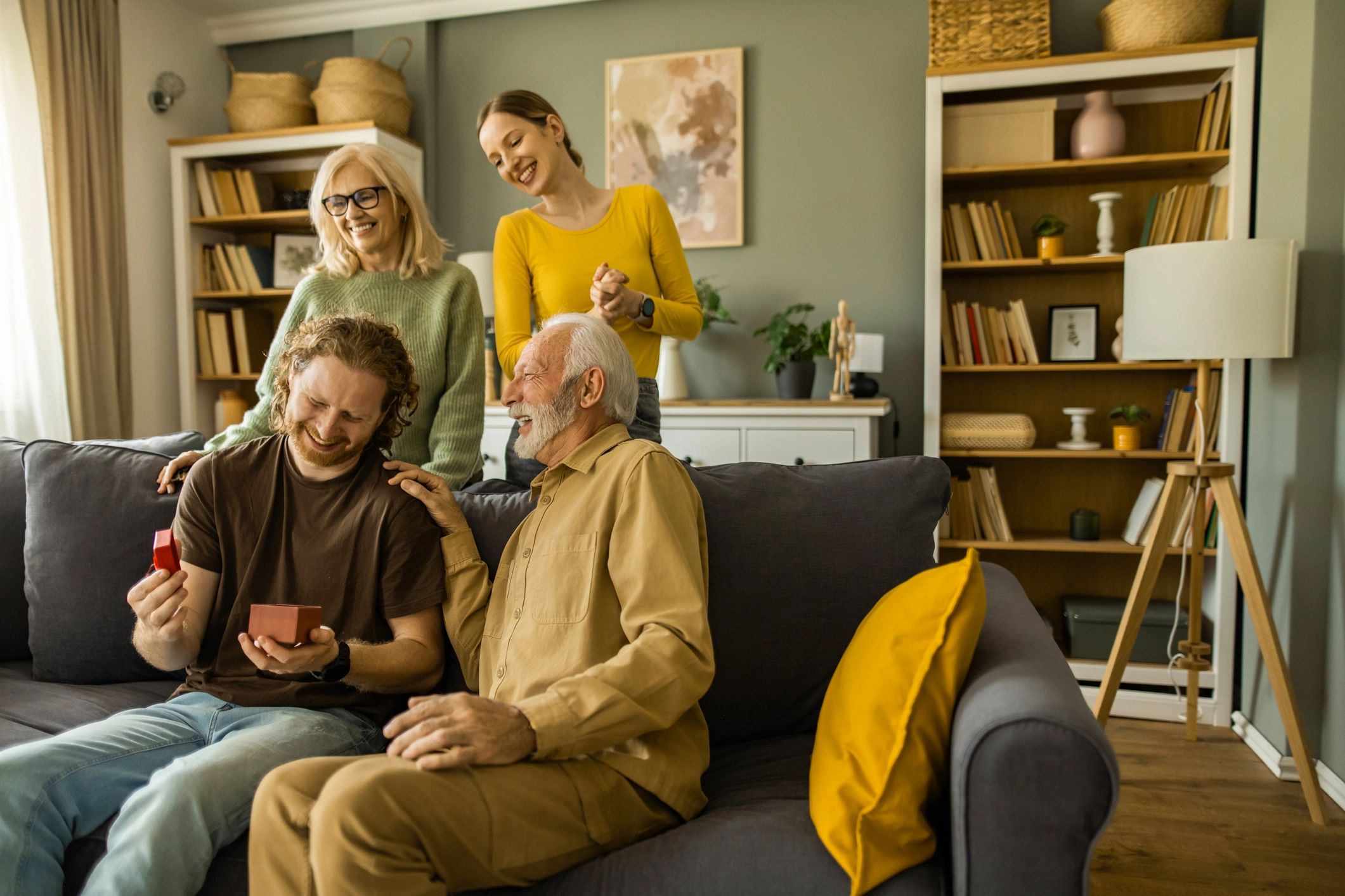 Family celebrating together in a living room