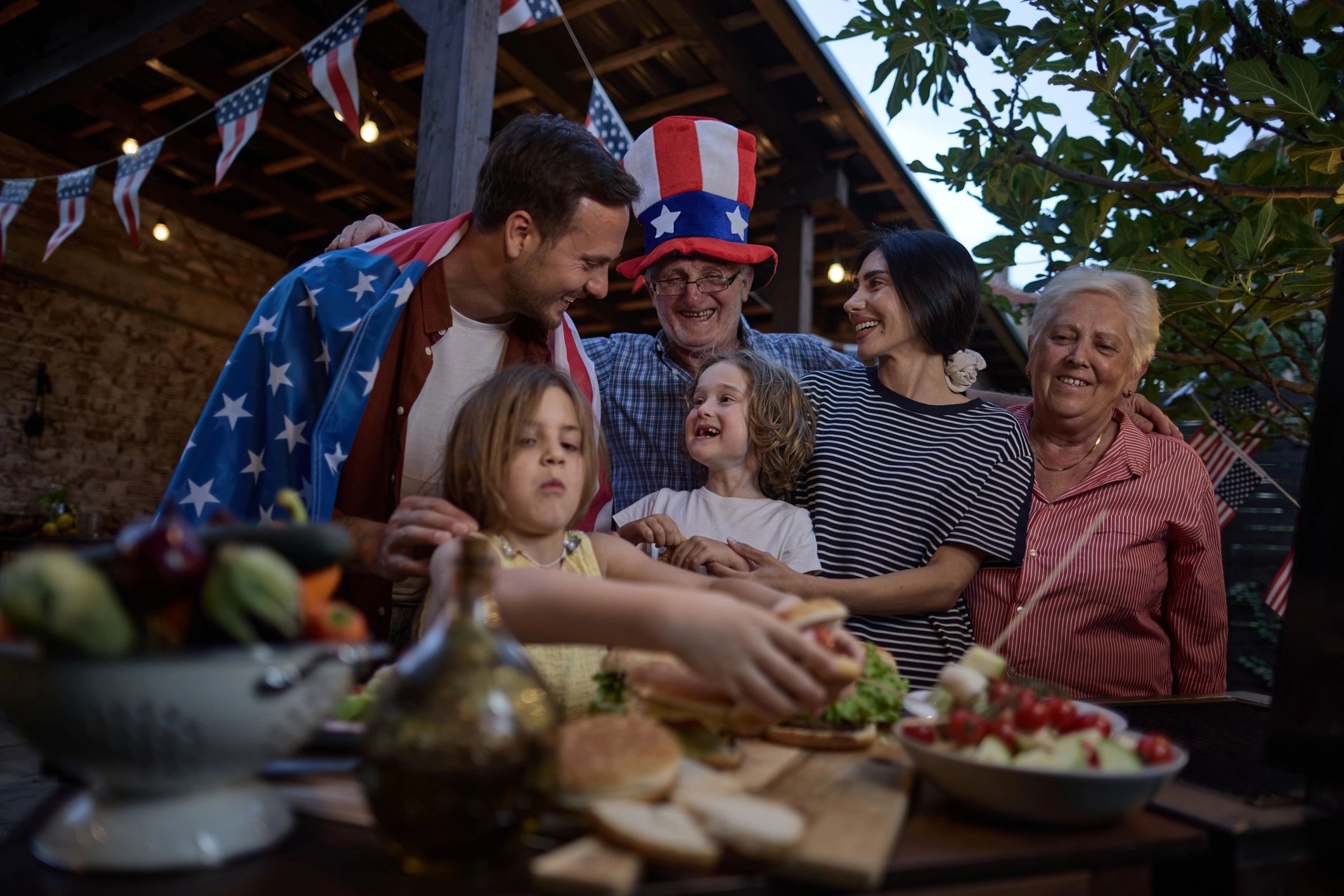Multi-generational family gathering outdoors